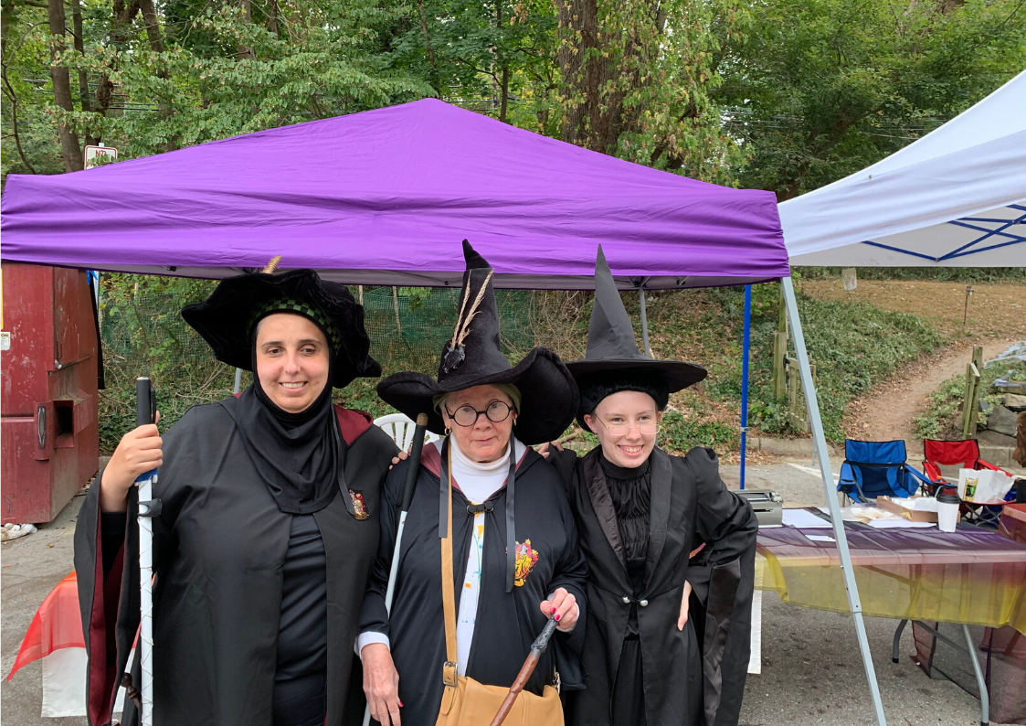 Participants dressed in costume for the NFB Meet the Blind Month Wizarding Weekend on Main in Old Ellicott City